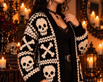 May include: A long-sleeved, open-front cardigan featuring a repeating crochet pattern of cream-colored skulls and crossbones set against a solid black background, complete with ribbed black cuffs and a matching ribbed collar trim.