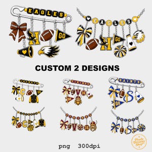 May include: A collection of digital graphic designs featuring safety pins and chains adorned with sports-themed charms like footballs, megaphones, bows, and team mascots. The designs include text labels such as EAGLES, JACKETS, VIKINGS, and SAINTS.