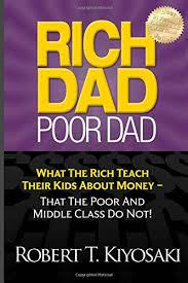 May include: The book cover features the title "RICH DAD POOR DAD" in large yellow letters against a purple background. Below the title is the subtitle "WHAT THE RICH TEACH THEIR KIDS ABOUT MONEY - THAT THE POOR AND MIDDLE CLASS DO NOT!" by Robert T. Kiyosaki.