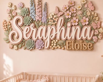 May include: A wall-mounted wooden sign featuring the name Seraphina Eloise in raised script and block lettering. The sign is decorated with three-dimensional carved flowers, succulents, butterflies, and small round berries in pastel pink, green, and blue.