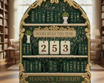 May include: A decorative bookshelf with the text "BOOKS READ THIS YEAR" and "HANNA'S LIBRARY". The bookshelf is green with gold accents and holds miniature books and small plants. The number "253" is displayed on hanging cards.