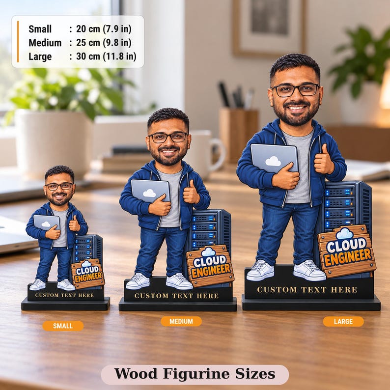 Three wood figurine sizes of the custom cloud engineer caricature side by side: small 20 cm (7.9 in), medium 25 cm (9.8 in) and large 30 cm (11.8 in), each on a flat black base.