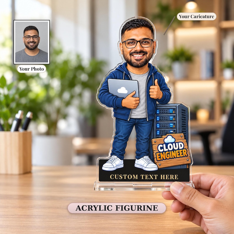 Custom cloud engineer caricature acrylic figurine made from a photo, held in a hand on its clear acrylic base and shown next to the customer's original photo.
