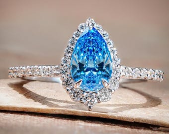 Anillo de compromiso con diamante azul cultivado en laboratorio en forma de pera, anillo de bodas con halo de graduación pavé de corte redondo, regalo de aniversario, anillo de diamante azul elegante