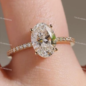 Exquisite 2.00 Carat Oval Cut Lab-Grown Diamond Engagement Ring with Hidden Halo & Pavé Accents in 18K Rose Gold | IGI Certified E-F-VVS2 |