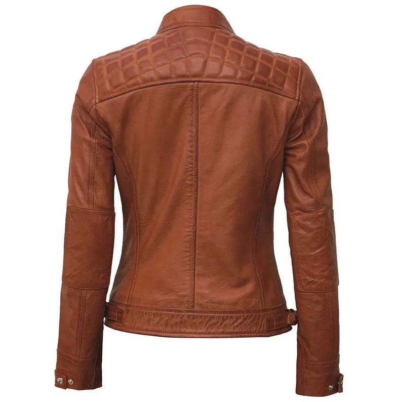 May include: A brown leather jacket with a quilted shoulder design. The jacket has a classic collar, long sleeves, and a fitted silhouette. The back view shows the tailored fit and details like the buttoned cuffs and waist belt.
