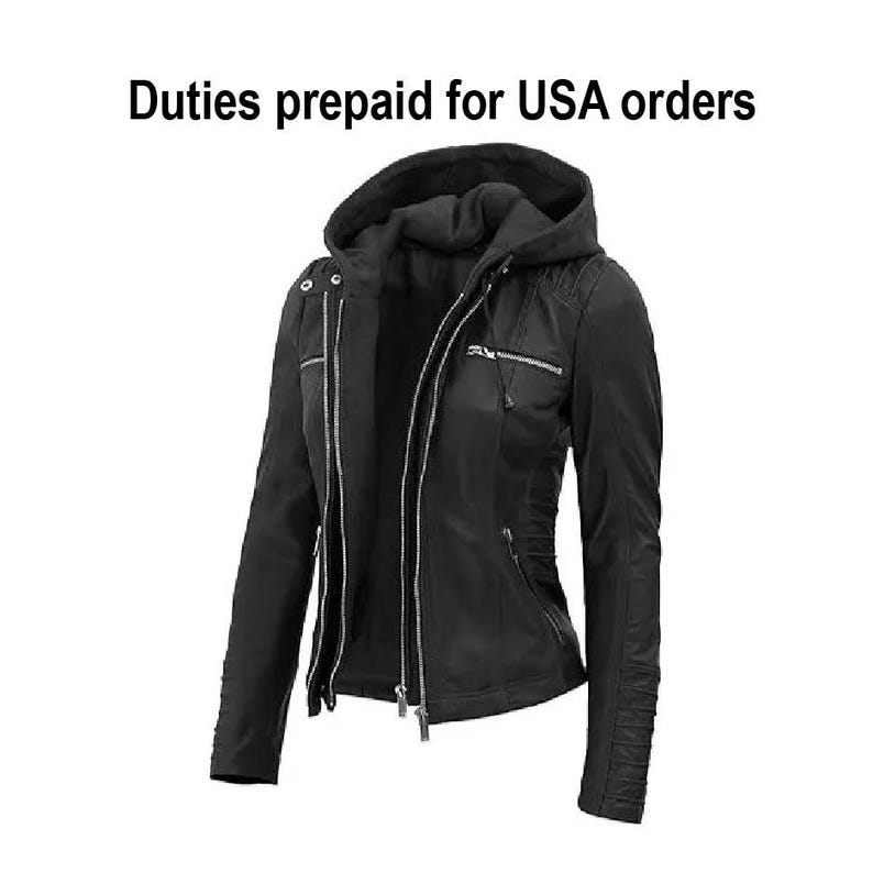 May include: A black hooded jacket with silver zippers and a fitted silhouette. The jacket has a quilted design on the shoulders and sleeves. The text "Duties prepaid for USA orders" is at the top.