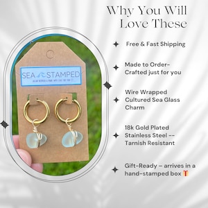 May include: Gold-plated hoop earrings with wire-wrapped, light blue cultured sea glass charms. The earrings are on a brown tag with the text "SEA STAMPED". The text "Why You Will Love These" is at the top of the image.