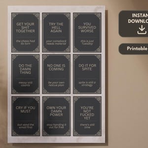May include: A printable PDF featuring a collection of dark gray cards with white text. Each card has a unique phrase, such as "Get Your Shit Together" and "Do the Damn Thing." The cards are framed with decorative borders.