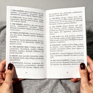 Classic Tarot English guidebook open showing Rider Waite tarot card meanings for Major Arcana, beginner friendly tarot instruction book