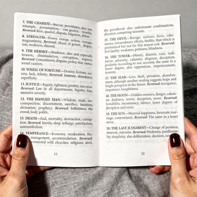 Classic Tarot English guidebook open showing Rider Waite tarot card meanings for Major Arcana, beginner friendly tarot instruction book