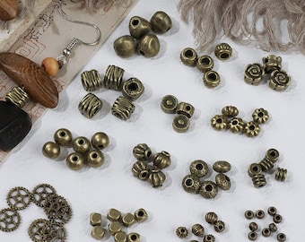 Perline distanziatrici in bronzo antico, perline sciolte in lega in stile tibetano, mix di copriperline a rondella vintage per la creazione di braccialetti in macramè.