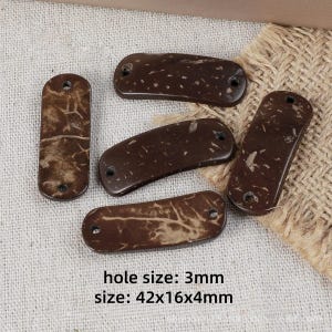 May include: Five rectangular dark brown coconut shell beads with rounded ends and two holes each. The beads feature natural mottled patterns and textures. Text on the image indicates a hole size of 3mm and a bead size of 42x16x4mm.