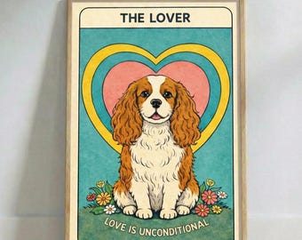 May include: A framed art print depicting a Cavalier King Charles Spaniel. The artwork has a teal background with a yellow and pink heart shape behind the dog. Text at the top reads "THE LOVER" and at the bottom "LOVE IS UNCONDITIONAL".