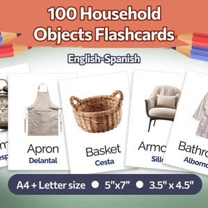 May include: A set of flashcards labeled "100 Household Objects Flashcards" in English-Spanish. The cards feature images of an alarm clock, apron, basket, armchair, and bathrobe. Card sizes are 5"x7" and 3.5"x4.5".