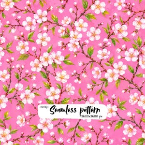May include: A seamless pattern featuring white cherry blossoms with yellow centers and green leaves on a bright pink background. A white rectangular label in the center displays the black text 300dpi Seamless pattern 3600x3600 px.