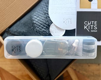 Travel Light Compact Cosmetics Kit: Mini skincare jars, droppers and travel size containers in a set for the frequent traveller