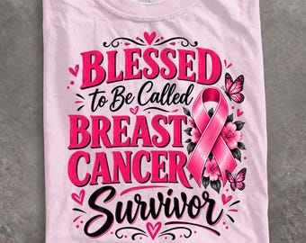 May include: A light pink t-shirt featuring a graphic print with the text BLESSED to Be Called BREAST CANCER Survivor. The design includes a pink awareness ribbon, pink flowers, and butterflies in shades of pink and black with decorative accents.