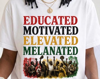 May include: A white short-sleeved t-shirt featuring the text EDUCATED in red, MOTIVATED in black, ELEVATED in yellow, and MELANATED in green. Below the text is a detailed illustration of a group of Black individuals in a historical setting.