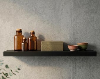Estantería flotante de pared Senyi de madera maciza, elegante, color negro, hecha a mano.