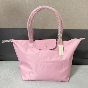 Longchamp roze nylon draagtas, groot, lichtgewicht, opvouwbaar, met leren afwerking, ideaal voor dagelijks gebruik.