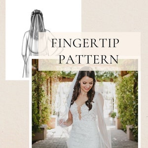 May include: A bride wearing a white lace wedding dress with a long, flowing veil. The veil is draped over her head and shoulders, and she is holding it in her hands. The bride is standing in a garden setting, with green plants and trees in the background. The text "FINGER TIP PATTERN" is displayed above the bride.