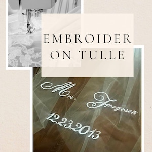 May include: White embroidery on a sheer tulle fabric with the text "Mrs. Ferguson 12.23.2013".
