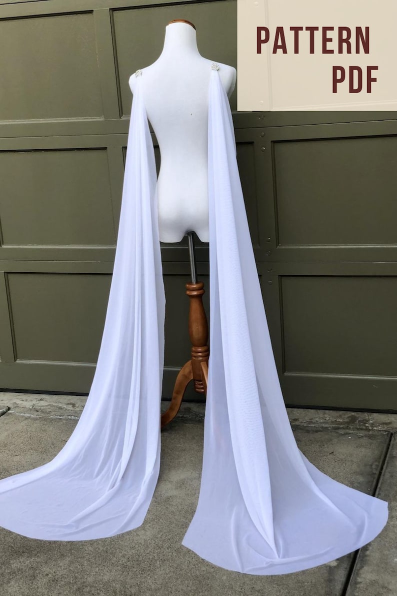 two separate long trailing white chiffon pieces of fabric hanging down mannequin, bridal wing veil alternative for brides without wedding dress train