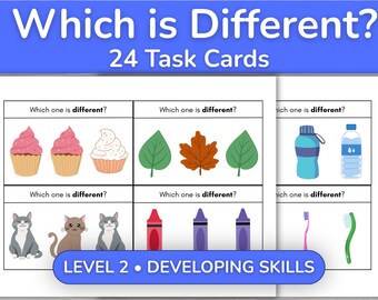 May include: A set of 24 task cards titled Which is Different? Level 2 Developing Skills. Each card features three illustrations with the text Which one is different? The images include cupcakes, leaves, water bottles, cats, crayons, and toothbrushes.