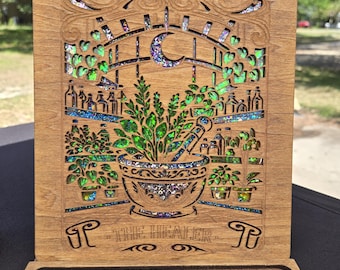 A calming, herbal‑inspired engraved wooden book valet with stained‑glass moon & greenery inlay