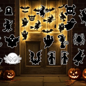 May include: Black Halloween decorations, including bats, ghosts, witches, and jack-o'-lanterns, hang in front of a wooden door. Two carved pumpkins with lit faces sit on the ground, creating a spooky atmosphere.