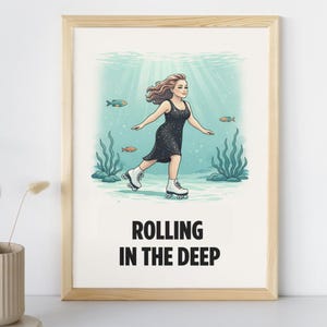 May include: A framed art print featuring a woman roller skating underwater. She wears a black dress and white roller skates. The text "ROLLING IN THE DEEP" is below the image. The background includes fish and aquatic plants.
