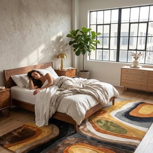 Handmade earth tone abstract wavy wool rug in a luxury living room