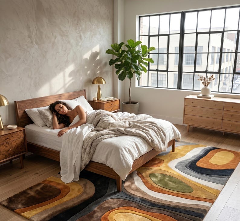 Handmade earth tone abstract wavy wool rug in a luxury living room