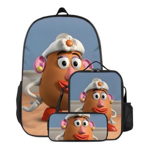May include: A set of three matching bags featuring a cartoon character. The set includes a black backpack, a lunch bag with a handle, and a pencil case. The character has a tan face, pink ears, a red mouth, and a white hat.