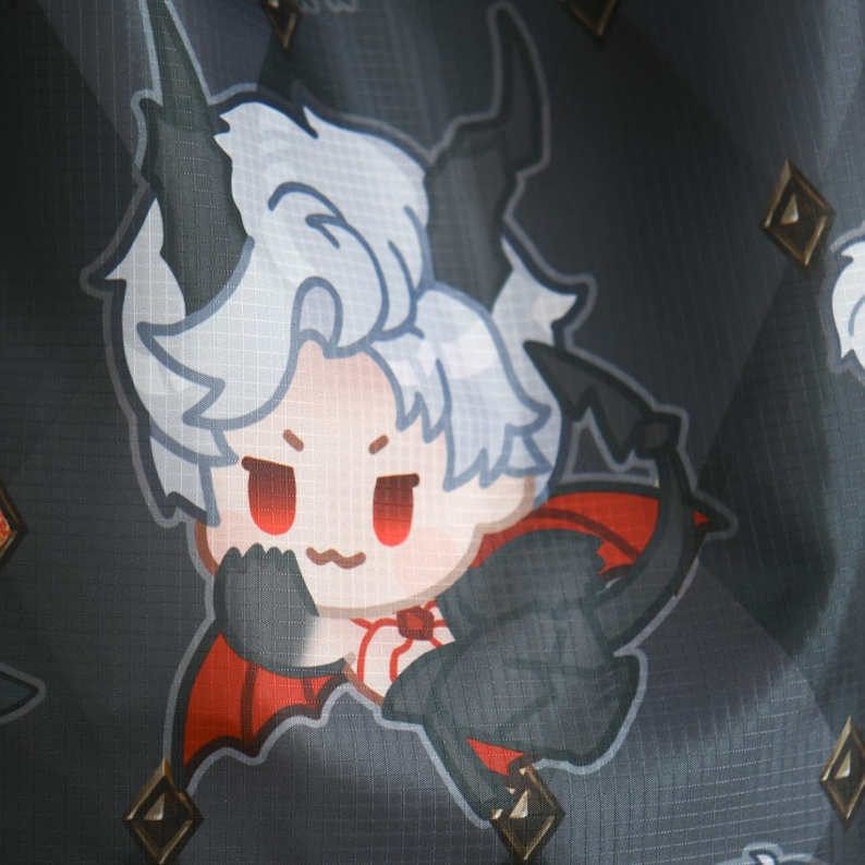 May include: A black and red cartoon character with white hair and horns. The character is wearing a red cape and has a mischievous expression.