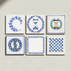 May include: A set of six square ceramic tiles featuring blue and white decorative patterns. Designs include a floral wreath, an hourglass inside a laurel, a second hourglass with green leaves, a blue onion ring, a wavy border, and a blue grid pattern.