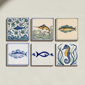 May include: A set of six square ceramic tiles featuring marine life illustrations. Designs include a blue swordfish in floral patterns, a yellow swordfish in waves, a mackerel, a blue fish icon, a stylised fish, and a yellow and blue seahorse.