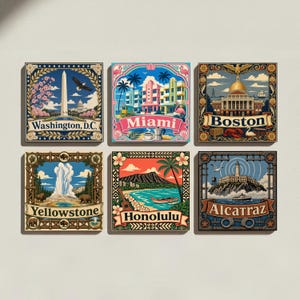 May include: A set of six square wall art prints featuring stylized illustrations of Washington, D.C., Miami, Boston, Yellowstone, Honolulu, and Alcatraz. Each print includes a decorative border, vibrant colors, and the city or landmark name.