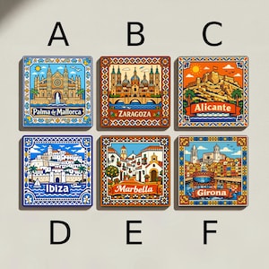 May include: Six square decorative magnets featuring colorful illustrations of Spanish cityscapes. Each magnet displays a different city name: Palma de Mallorca, Zaragoza, Alicante, Ibiza, Marbella, and Girona. The magnets have ornate borders.