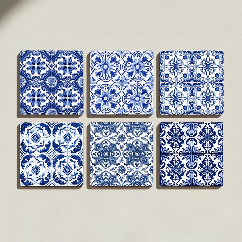Close-up of a ceramic coaster featuring hand-painted style cobalt blue floral motifs on white glaze