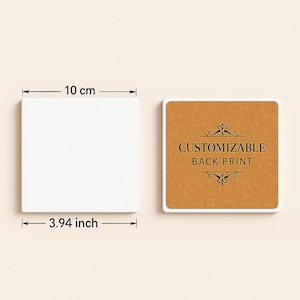 May include: Two square coasters, one white and one brown, with measurements of 3.94 inches. The brown coaster has the text "CUSTOMIZABLE BACK PRINT" with decorative flourishes. The white coaster is blank.