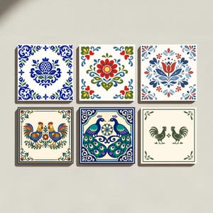 May include: A set of six square ceramic tiles featuring diverse decorative patterns. Designs include blue floral motifs, a central red flower, a tulip, two colorful roosters, two peacocks with ornate tail feathers, and two green roosters on cream.