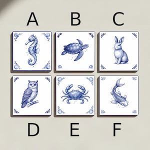 May include: Six square ceramic tiles with blue and white illustrations of marine life and animals. The tiles feature a seahorse, turtle, rabbit, owl, crab, and koi fish. Each tile has a decorative border with seashell and floral motifs.