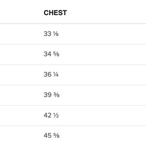 May include: A white chart with size measurements for clothing. The chart includes sizes XS to 2XL, with corresponding chest and waist measurements in inches. The chest measurements range from 33 1/8 to 45 5/8 inches, and waist measurements from 25 1/4 to 37 3/4 inches.