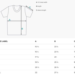 May include: A diagram of a t-shirt with labeled measurements for half chest width, length, and sleeve length. A size chart shows measurements in inches for XS, S, M, L, XL, and 2XL sizes.