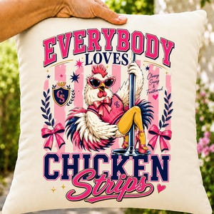 May include: A square off-white throw pillow featuring a graphic of a chicken wearing sunglasses and a pink vest, dancing on a pole. The text reads EVERYBODY LOVES CHICKEN Strips, Classy Sassy & Feathered, with pink bows, stars, and a crest logo.