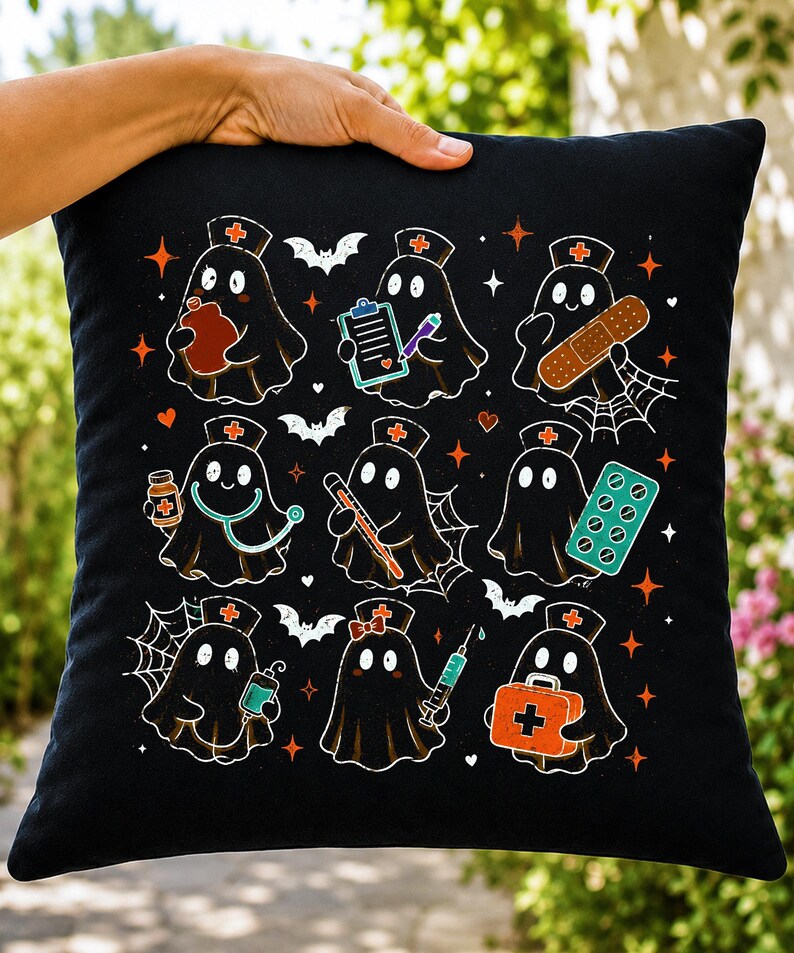 May include: A black square throw pillow featuring a repeating pattern of nine cartoon ghosts dressed as nurses. The ghosts are depicted with medical items including a clipboard, bandage, stethoscope, thermometer, pills, IV bag, syringe, and medical kit.