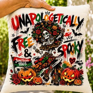 May include: A square throw pillow featuring a skeleton with an afro hairstyle, wearing sunglasses and platform boots. The text reads UNAPOLOGETICALLY FREE & SPOOKY and JUNETEENTH 1865. The design includes pumpkins, bats, roses, and a flag in red, black, and green.