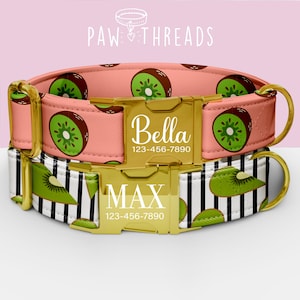 May include: Two personalized dog collars. The top collar is pink with kiwi fruit designs and a gold buckle with the name "Bella" and a phone number. The bottom collar is black and white striped with kiwi fruit designs and the name "MAX" and a phone number.